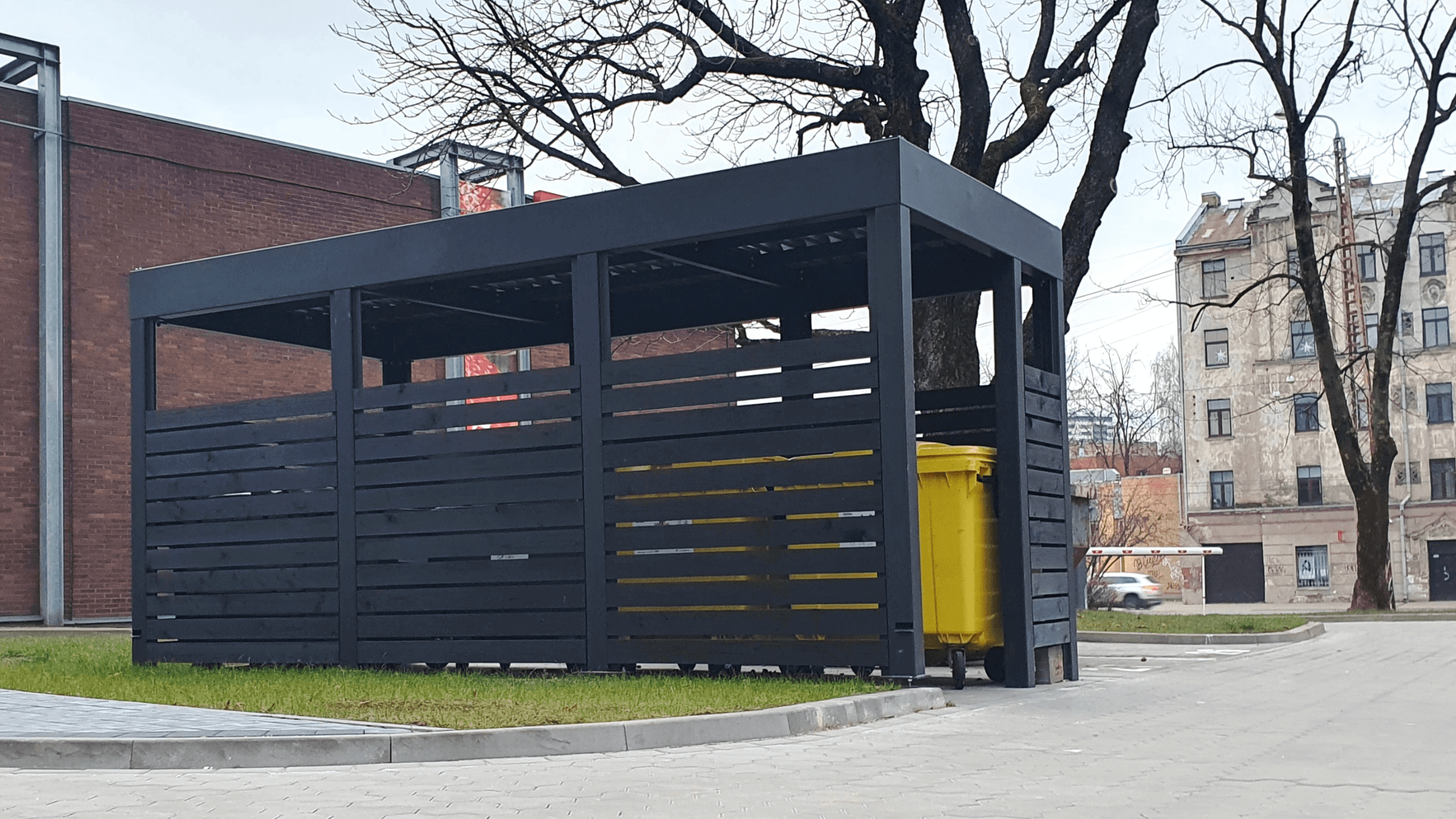 Dumpster enclosure in an urban environment