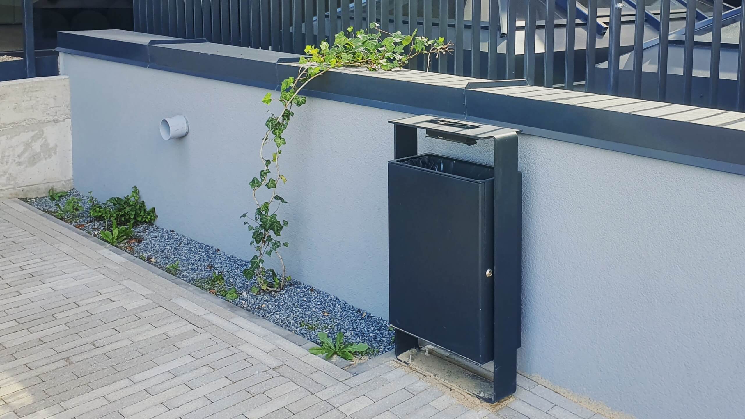 meta litter bin in an urban environment