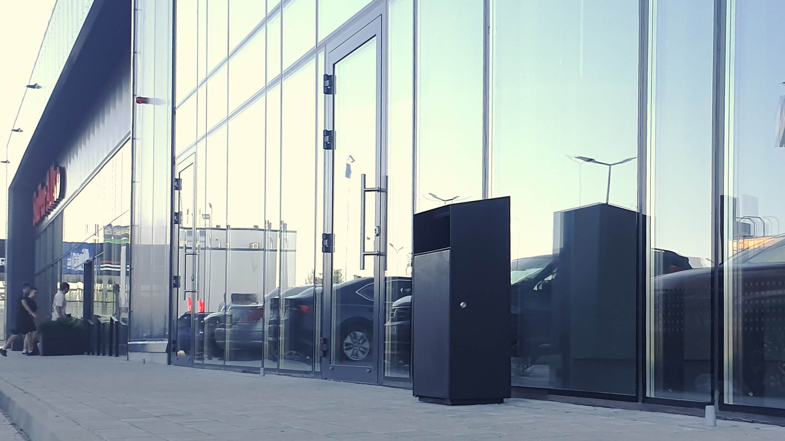 outdoor stell garbage can in an urban environment